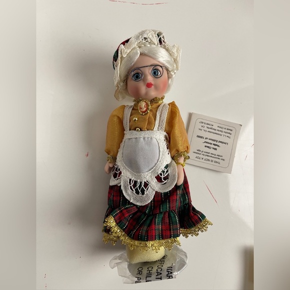 Marie Osmond Other - Traditional Doll with Yellow and Red Outfit